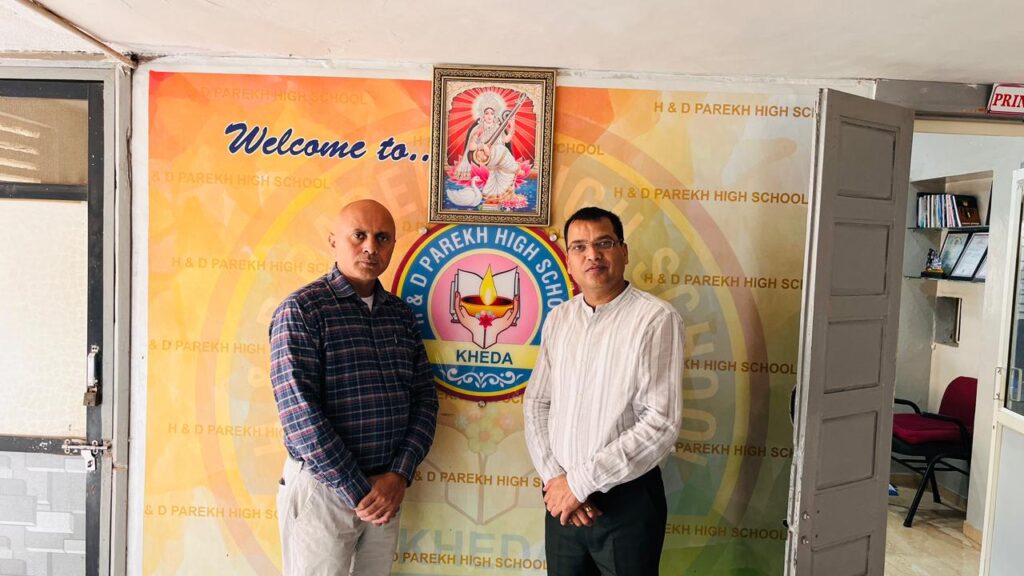 PatelMexico and Principal Rajendra Goswami of H. & D. Parekh High School in Kheda