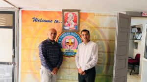 PatelMexico and Principal Rajendra Goswami of H. & D. Parekh High School in Kheda
